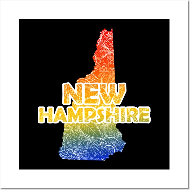 Colorful mandala art map of New Hampshire with text in blue, yellow, and red Wall Art by Happy Citizen